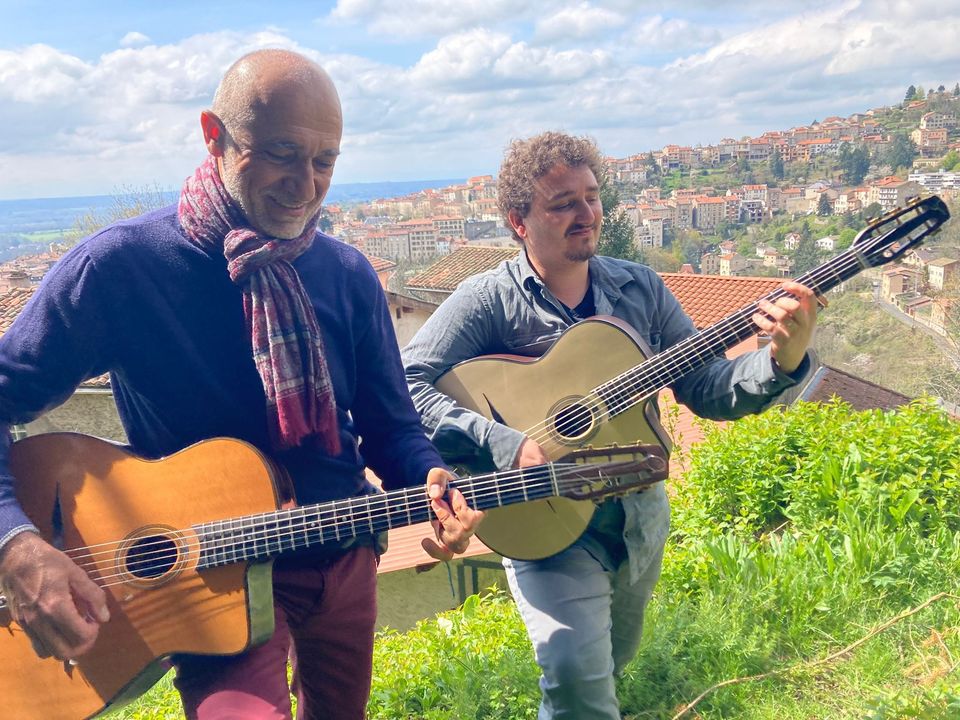 May be an image of 2 people, accordion and guitar