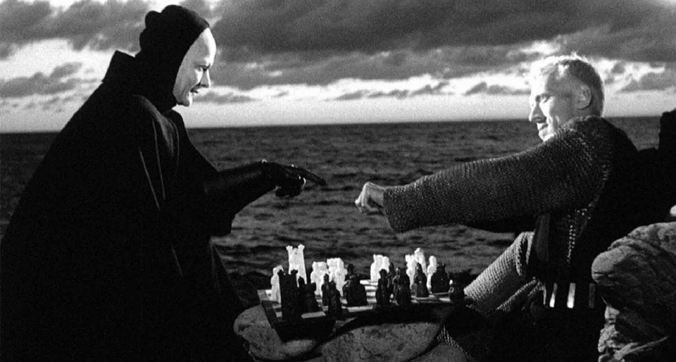 May be a black-and-white image of 2 people and chess